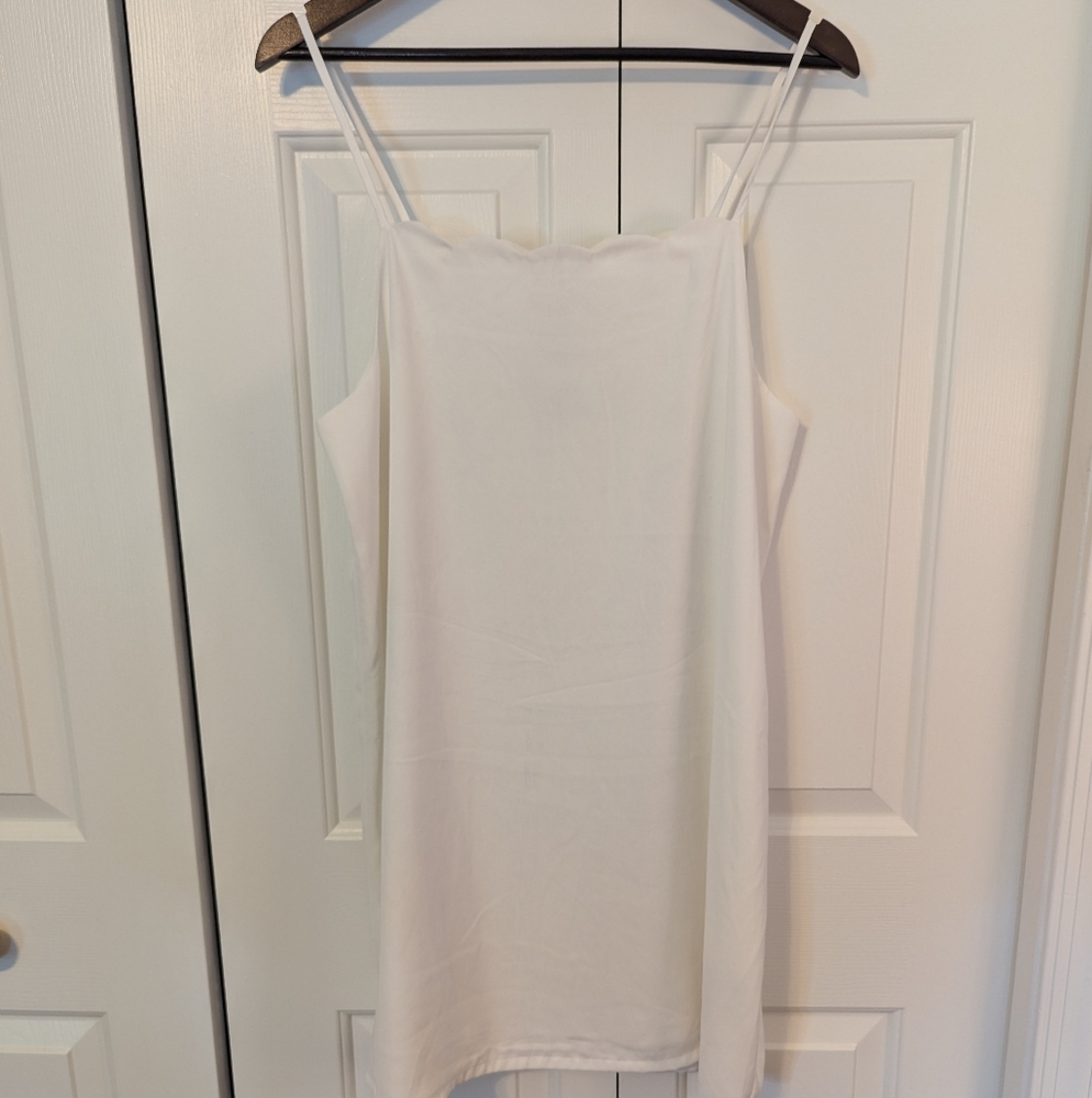 Large white scalloped neck dress
